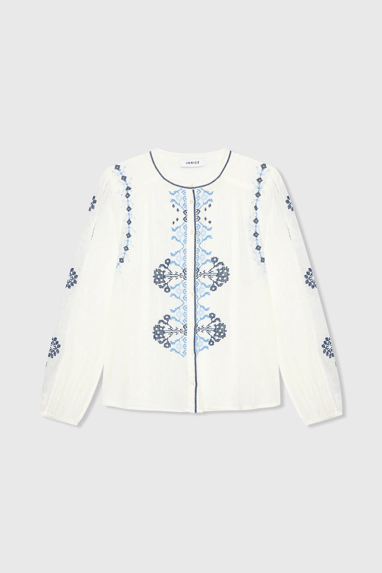 White cotton blouse with blue embroidery by Austin | Shop JANICE