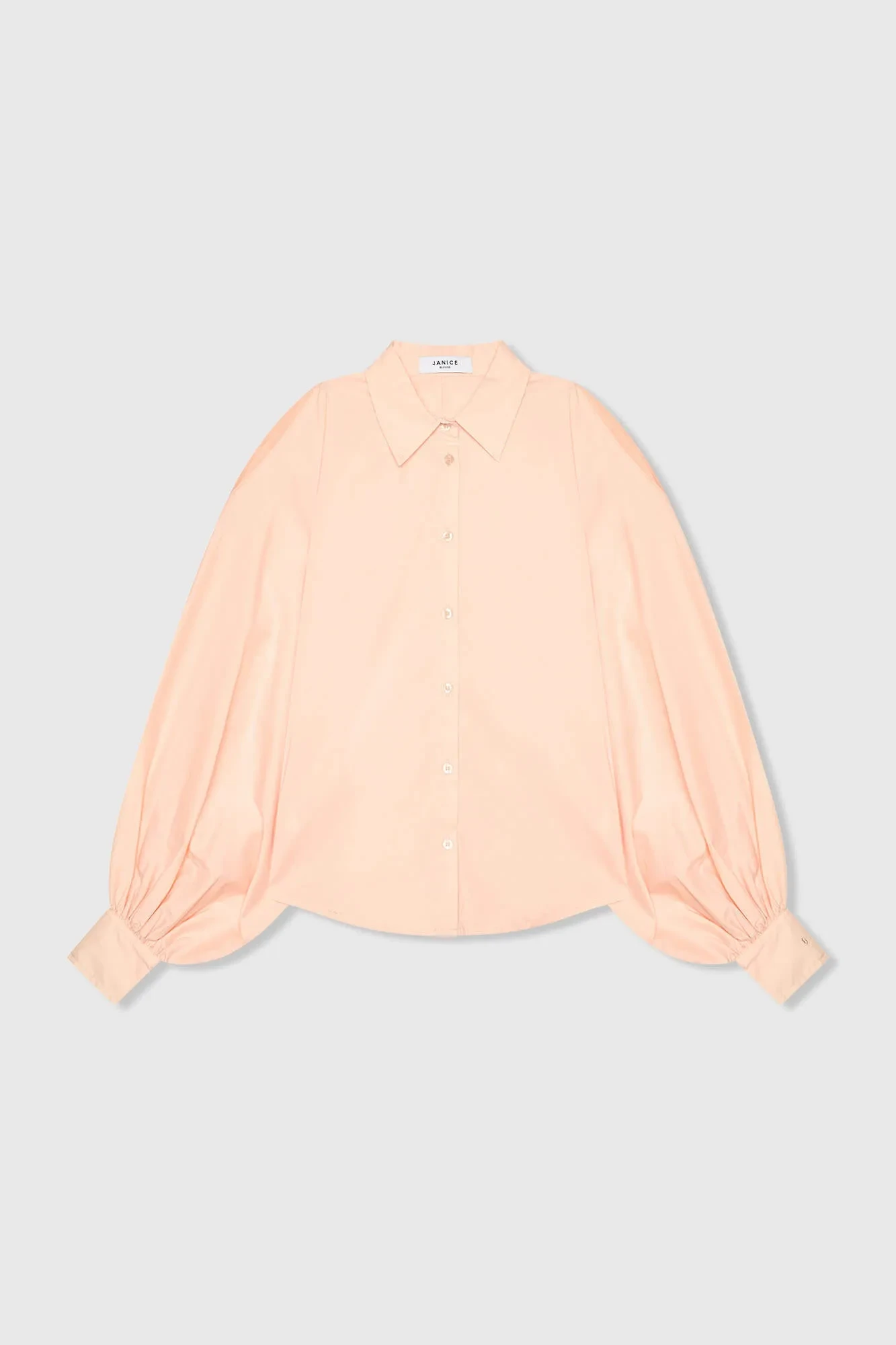 Damenbluse aus Baumwolle in Pfirsichfarben mit Puffärmeln und Cut-outs
