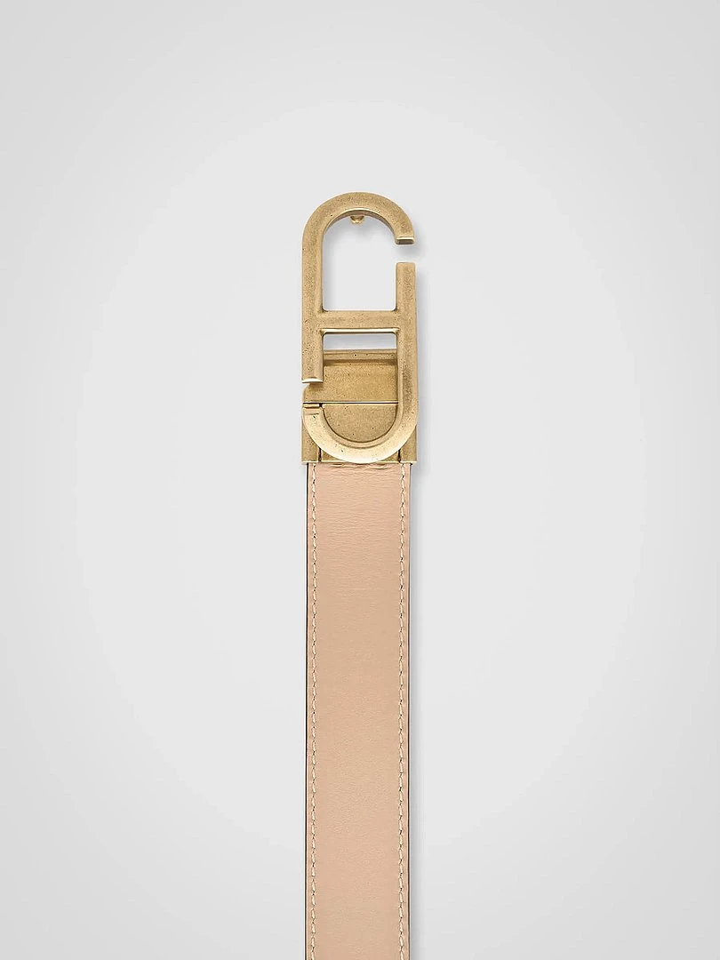 Wendbarer Damengürtel aus Leder, schwarz-taupe, mit Messing-Trophy-Schnalle