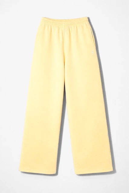 Yellow women's sweatpants by Luther